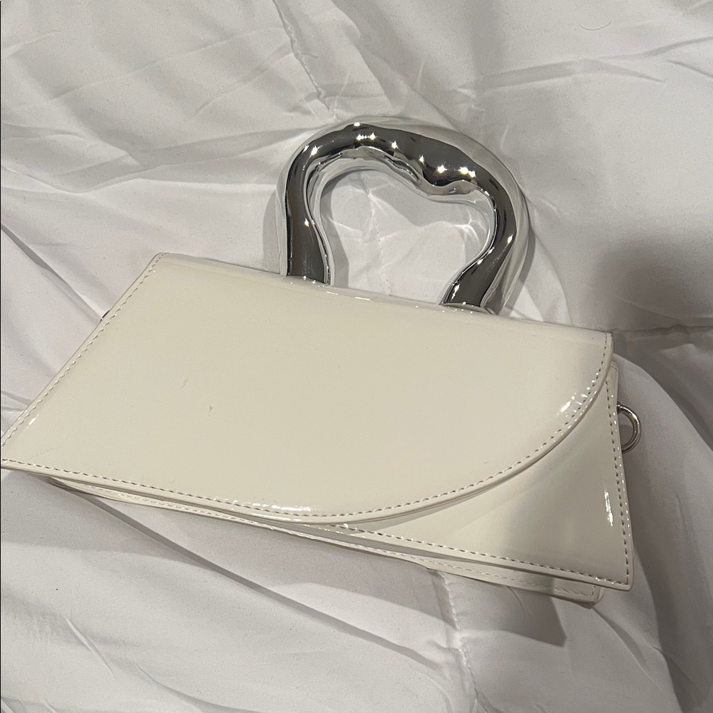 Stylish Cream Clutch with Silver Heart Handle
